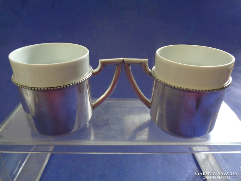 Pair of antique silver coffee cups