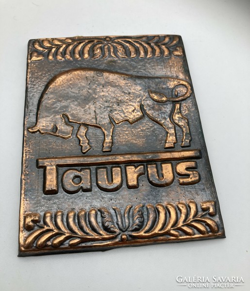 Taurus rubber company embossed copper plaque from the 1970s