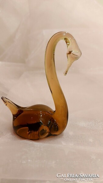 Glass swan figure.