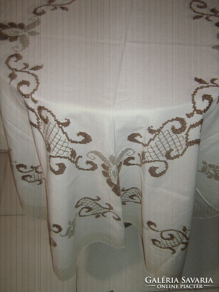 Beautiful hand-embroidered woven tablecloth with a baroque pattern