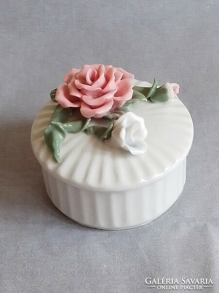 Antique old round porcelain bonbonier, sugar bowl with lid, storage box, plastic rose on the lid