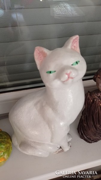 White concrete cat, cat figure, plastic cat statue