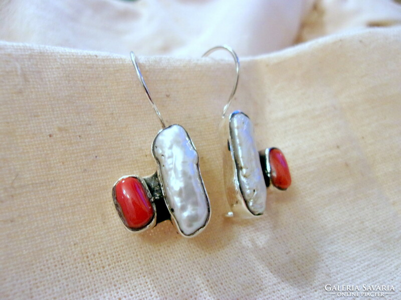 Unique silver earrings with a large freshwater pearl and coral decoration