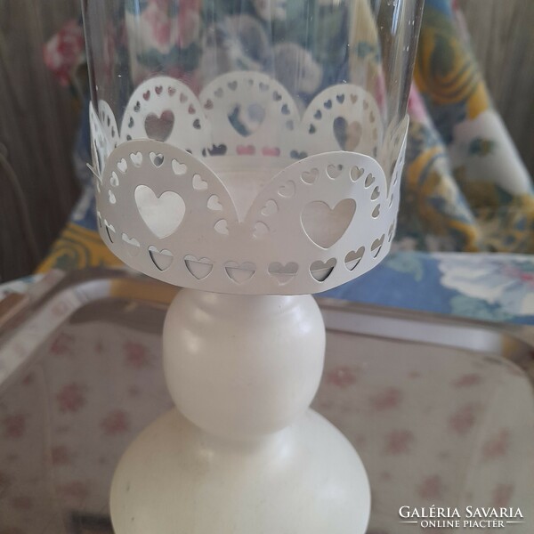 Candle holder with glass cover.