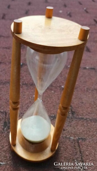 Huge hourglass on a wooden frame