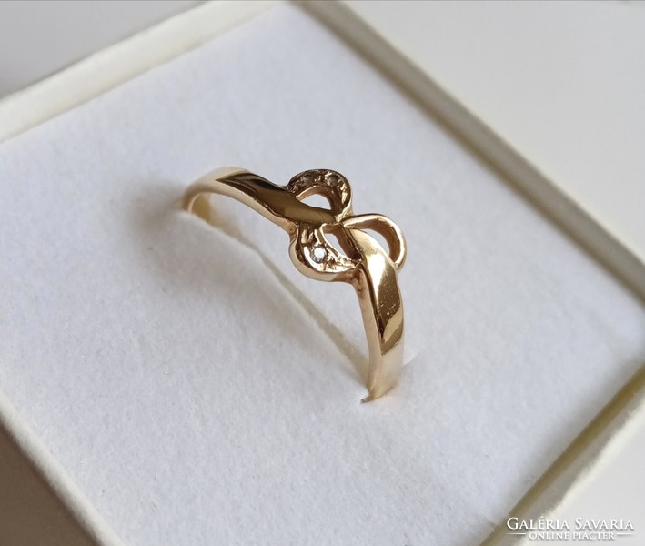 14K older, bow-like gold ring