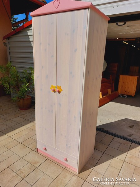 For sale is a pink-white girl's pine cabinet furniture in good condition, yellow sticker can be removed