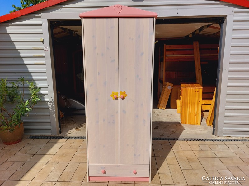 For sale is a pink-white girl's pine cabinet furniture in good condition, yellow sticker can be removed