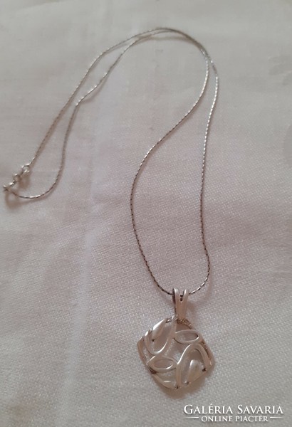 Showy silver necklace with pendant