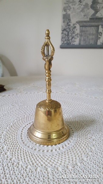 Brass hand bell, bell with face/head and crown handle