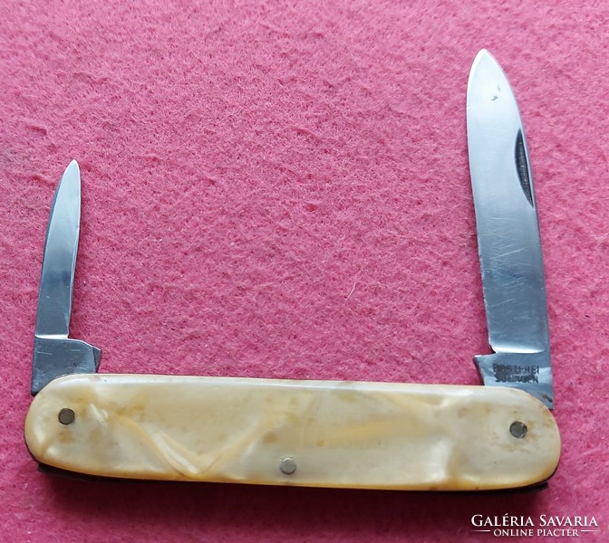Knife with mother-of-pearl handle