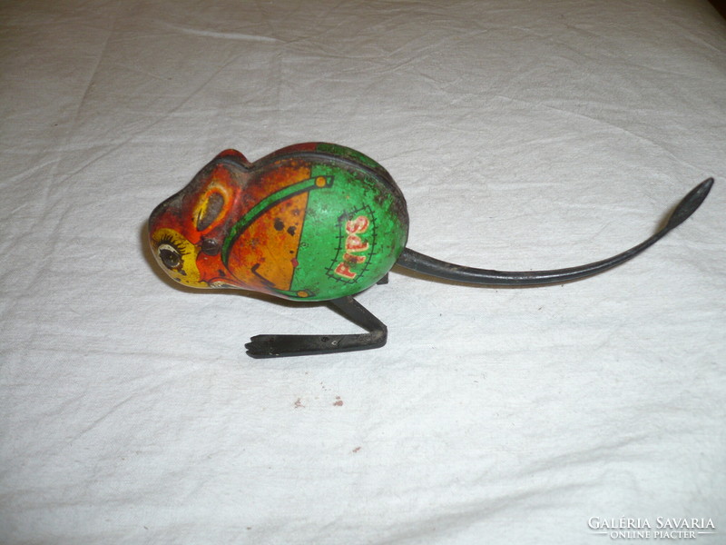 Old wind-up game disc mouse