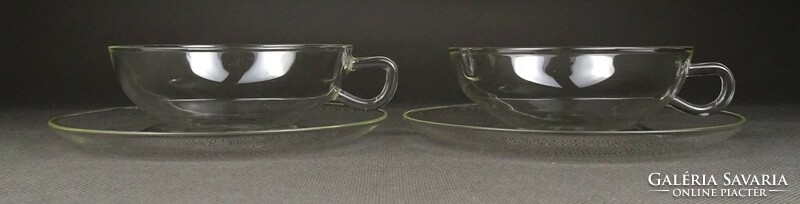 Pair of heat-resistant glass teacups marked 1R094