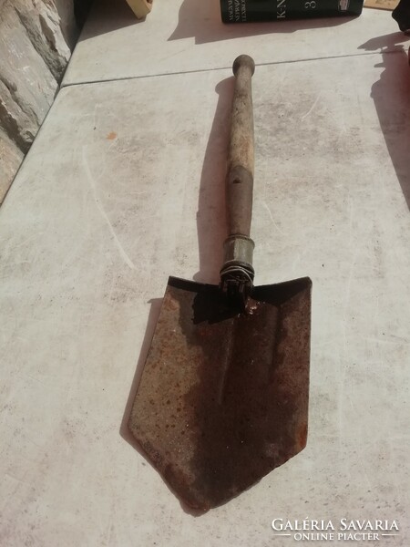 Old military spade in the condition shown in the pictures