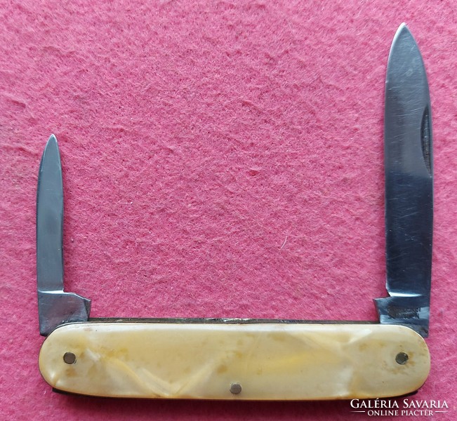 Knife with mother-of-pearl handle