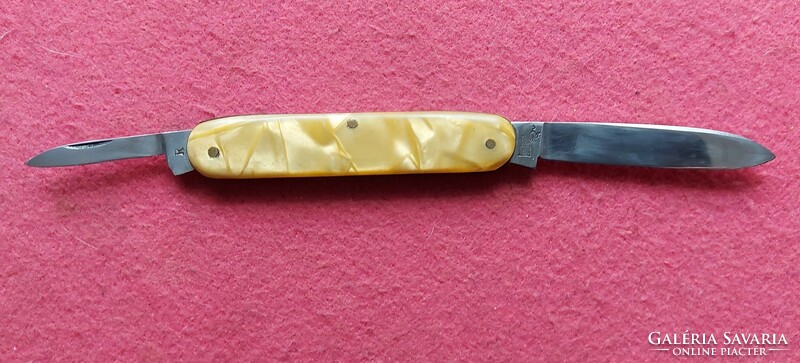 Knife with mother-of-pearl handle