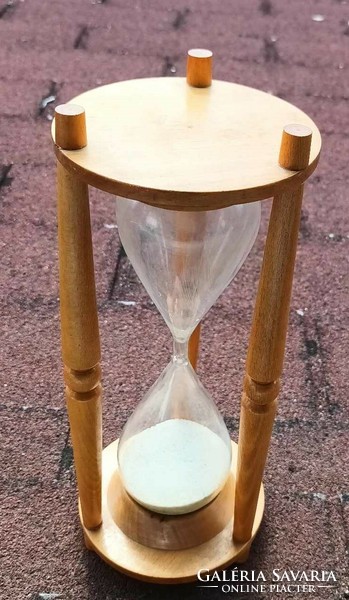 Huge hourglass on a wooden frame