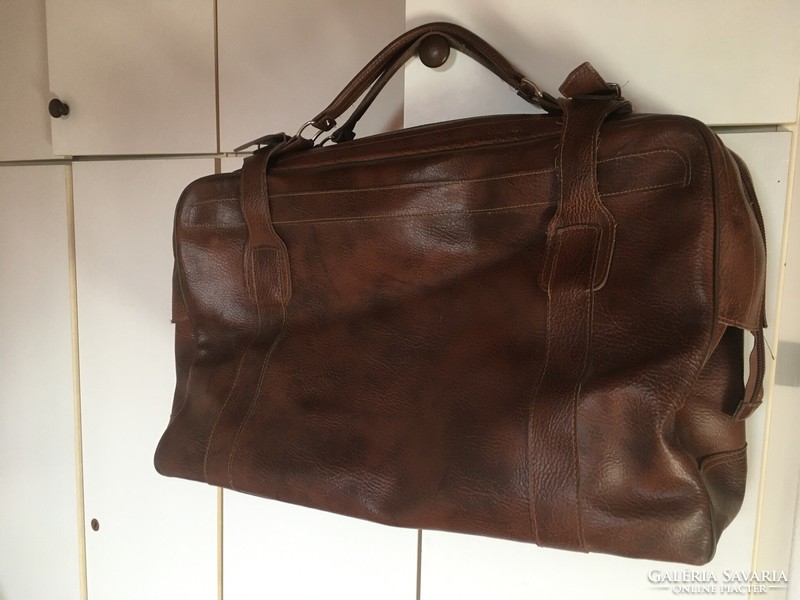 Old large brown travel bag