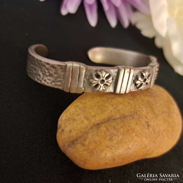 Silver-plated craftsman bracelet.