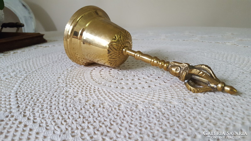 Brass hand bell, bell with face/head and crown handle