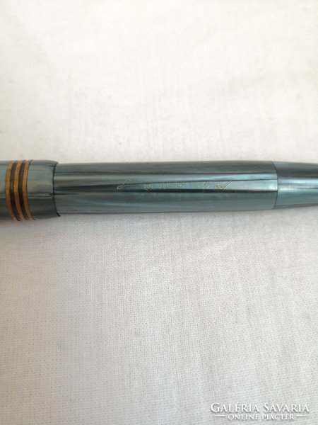 Signo brand pen with a gold tip