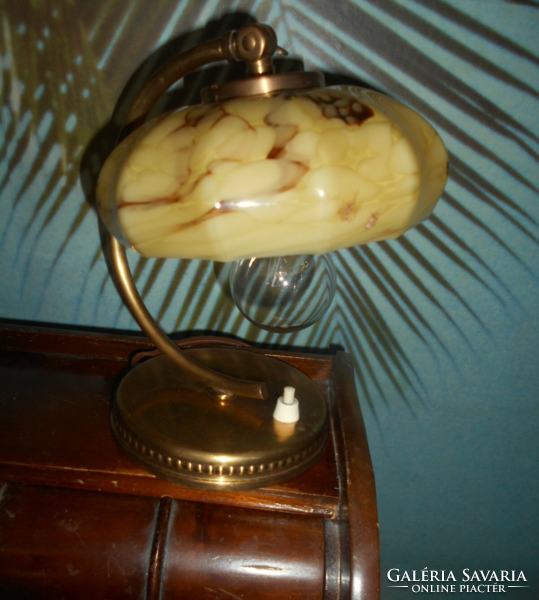 Table lamp with a glass shade with a marble pattern
