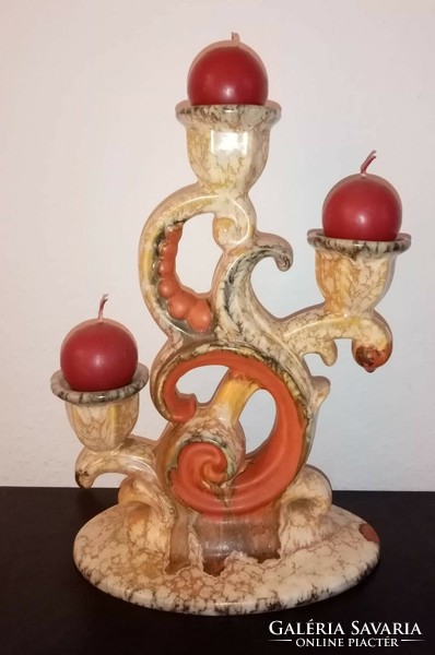Vintage. A large ceramic candle holder depicting dripping wax is for sale