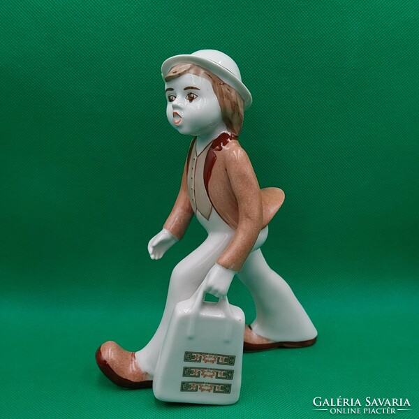 Retro walking boy porcelain figurine