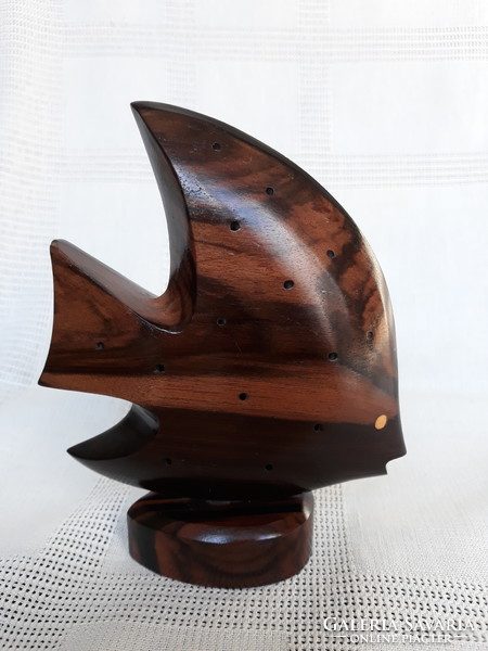 Art deco style fish carved from tropical wood