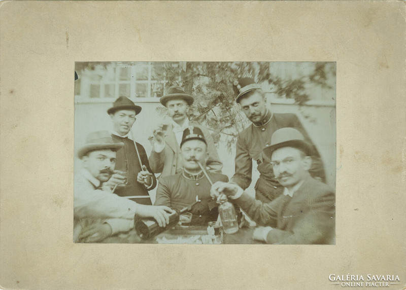 Early 1900s. Interesting company of men, while drinking.