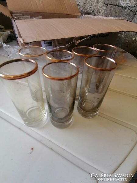 Vintage liqueur glasses with metal bases and a box with several options to choose from