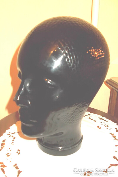 Glass wig holder head.