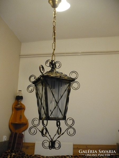 Antique wrought iron ceiling lamp.