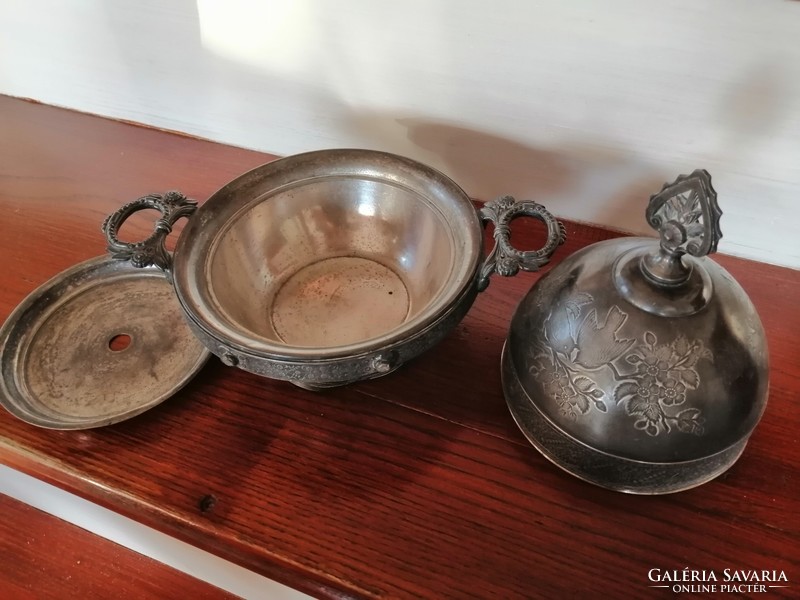 A silver-plated antique that keeps food warm