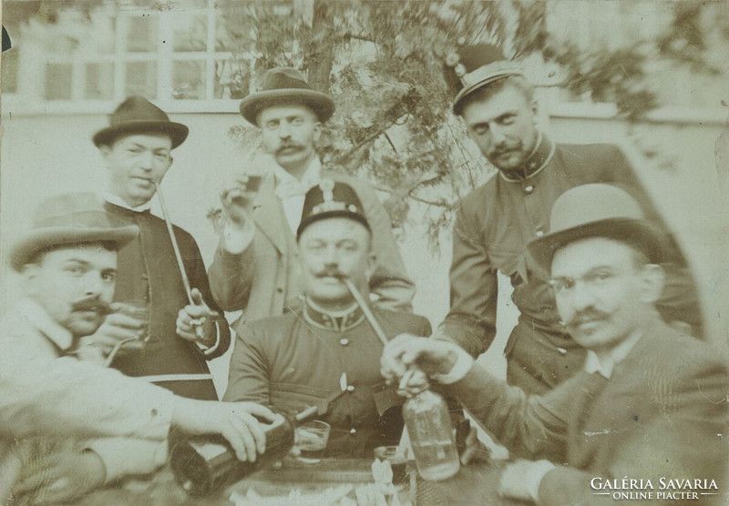 Early 1900s. Interesting company of men, while drinking.