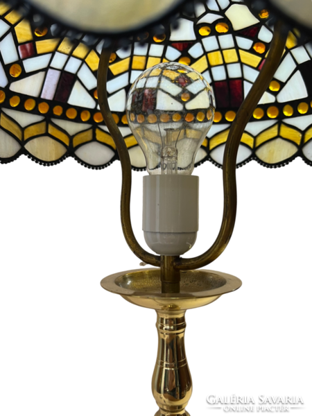 Antique copper table lamp with colored tiffany glass shade