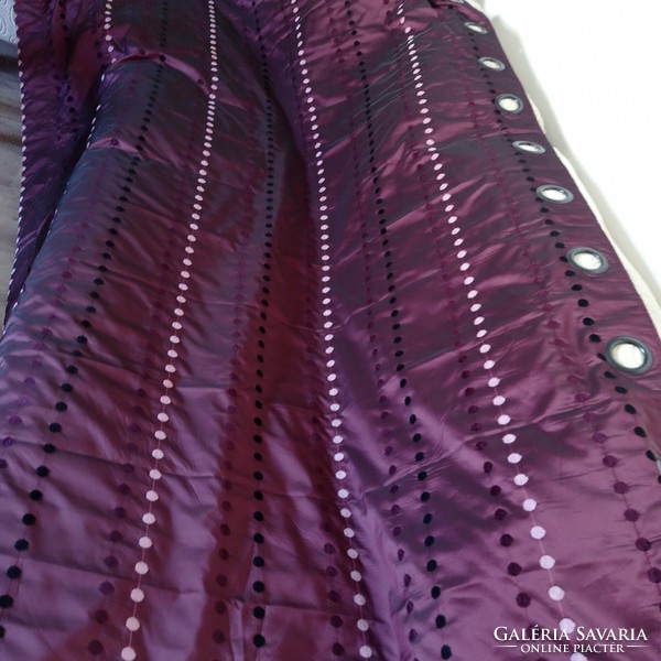 A pair of lined blackout curtains