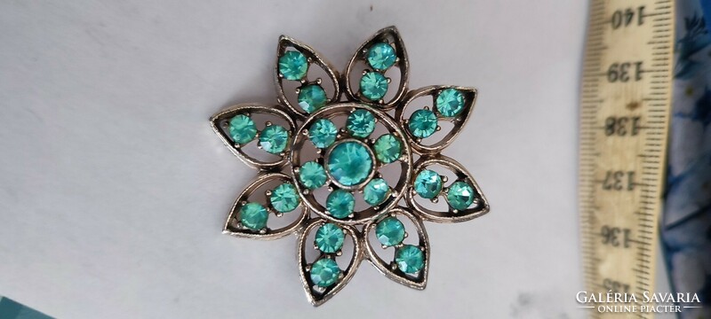 Brooch is a beautiful and showy piece in turquoise color