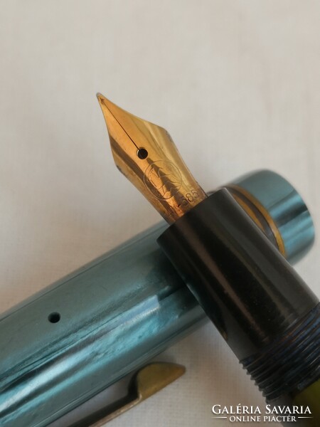 Signo brand pen with a gold tip