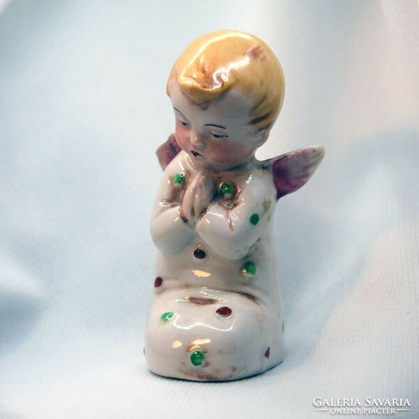 Kneeling angel - old German porcelain - one wing is damaged