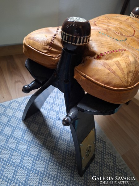 Camel with leather seat