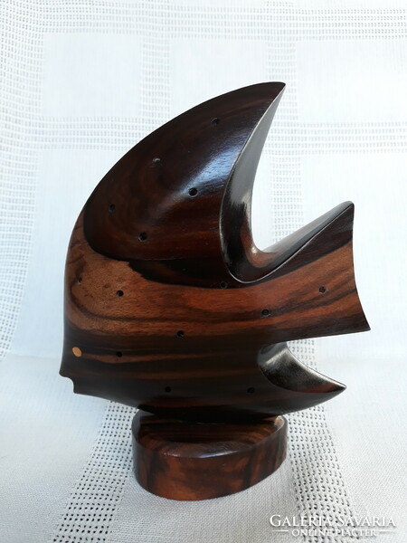 Art deco style fish carved from tropical wood