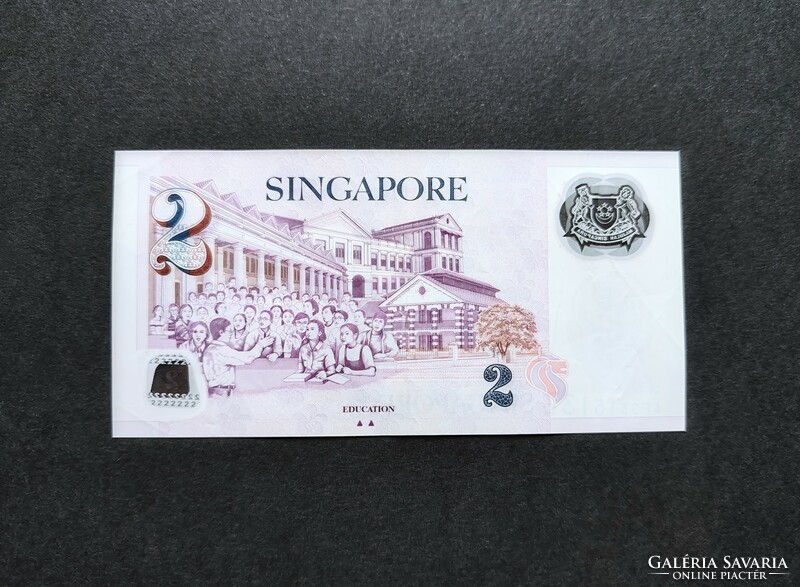 Singapore 2 dollars 2011, vf+ (polymer) two triangles.