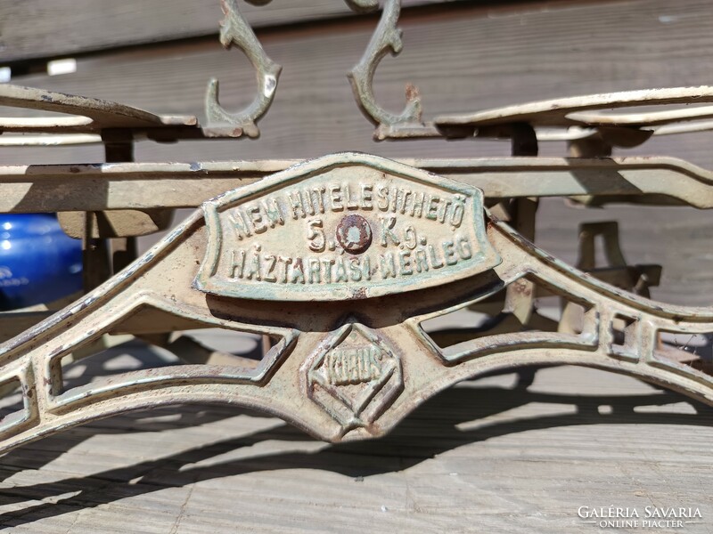 Antique cast iron scales with weights.