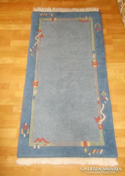 Hand-knotted gabbeh carpet. 140X72 cm
