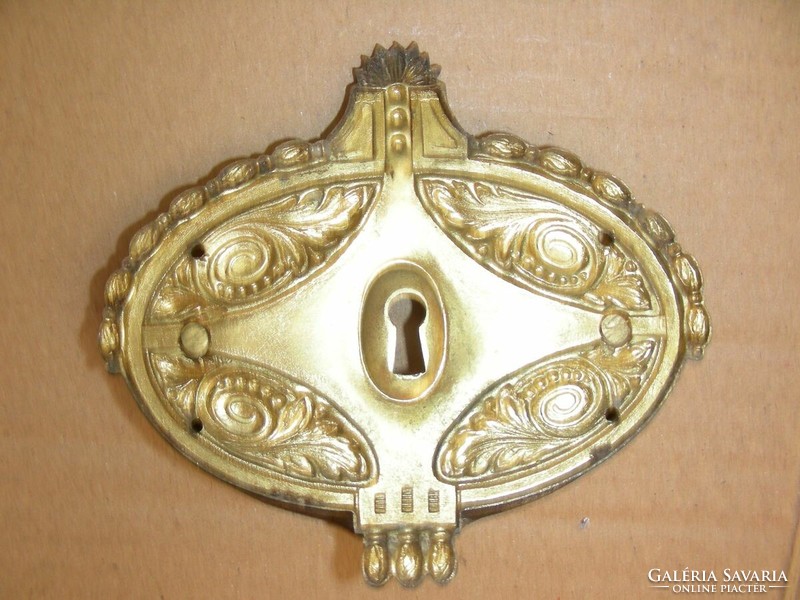 Antique eclectic lock cover made of copper