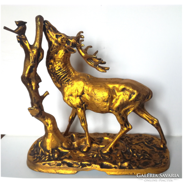 Large golden deer statue