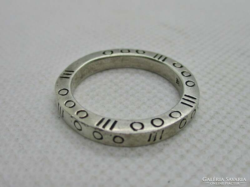 A silver ring with a special pattern