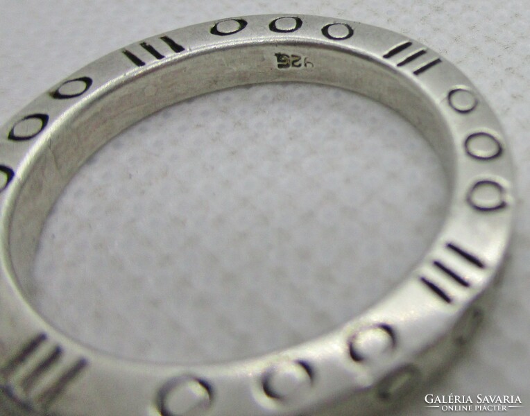 A silver ring with a special pattern