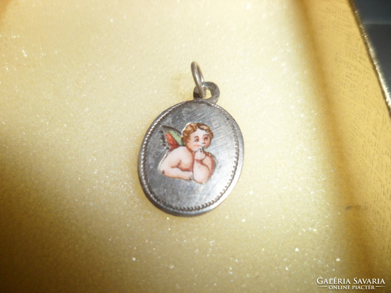 Antique silver putto pendant